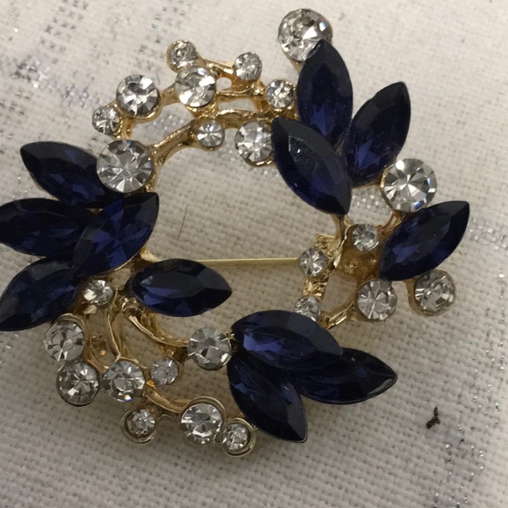 Elegant Gold and Blue Brooch